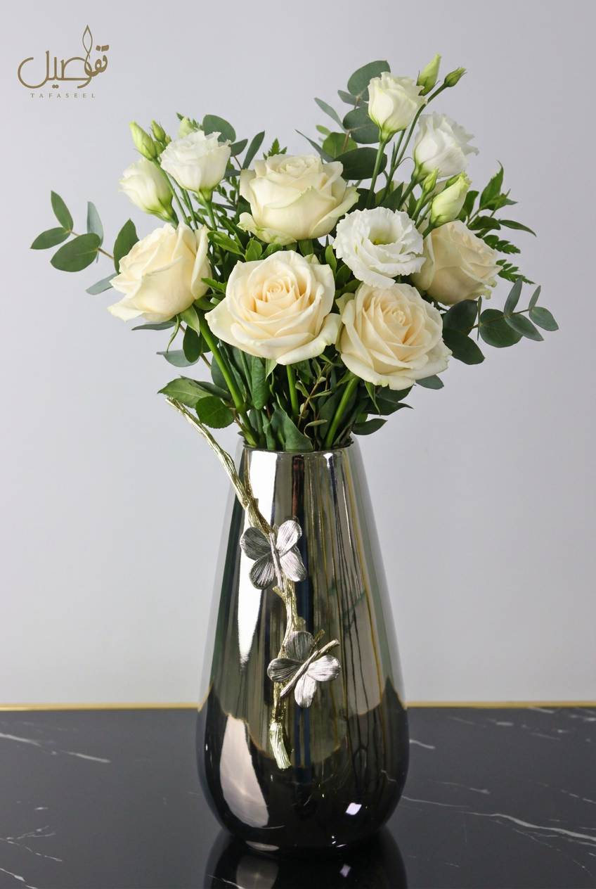 Vase styled with fresh white flowers